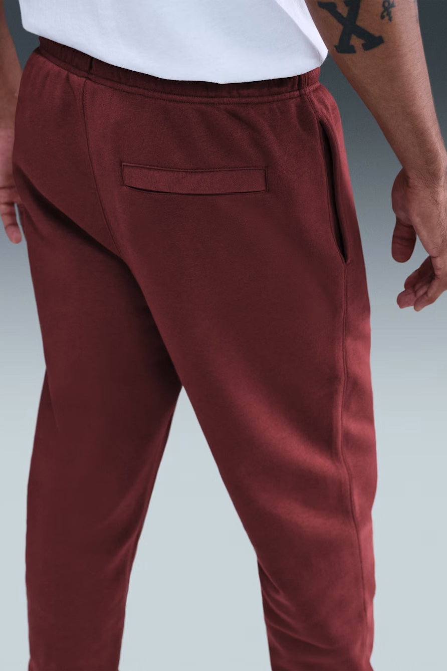 Sportswear Club - Pantaloni da ginnastica in pile - Rosso squadra scuro