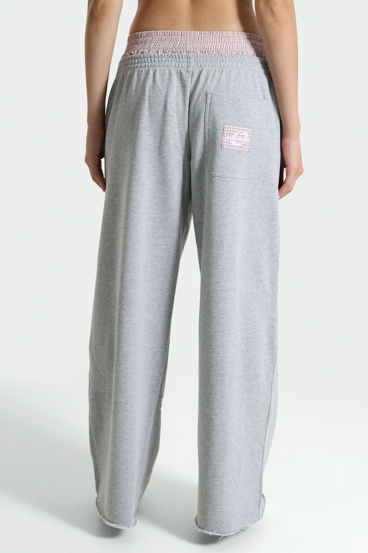 Pantalone in felpa - Grigio mélange + Rosa