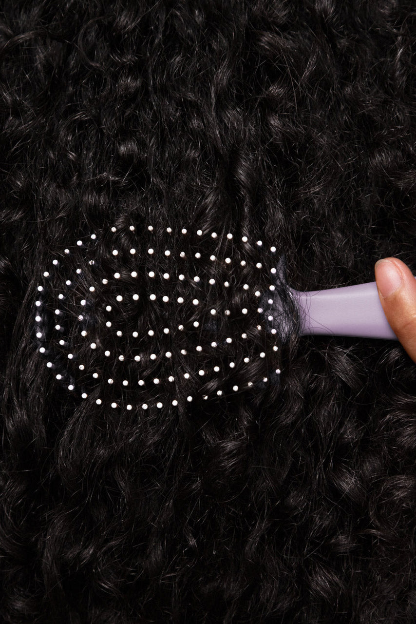 Mini spazzola per capelli