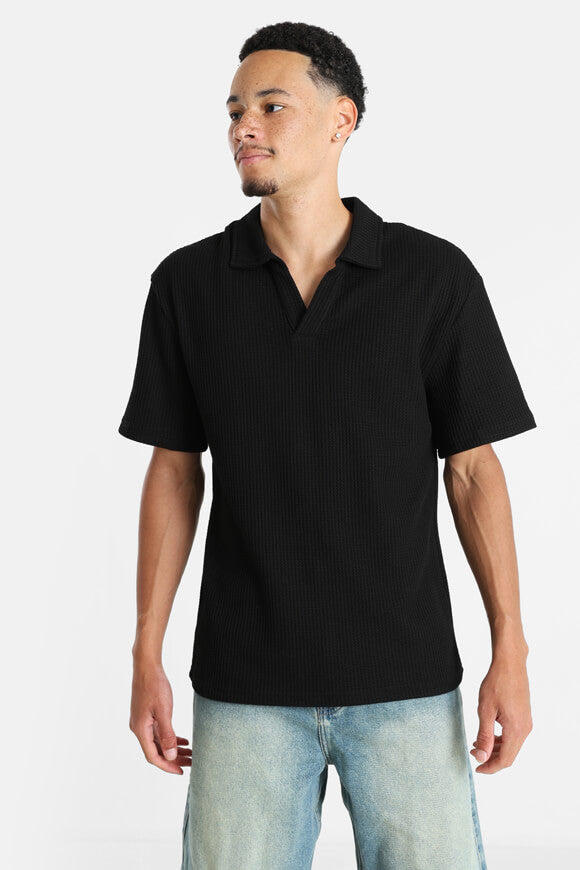 Polo con struttura waffle - nero