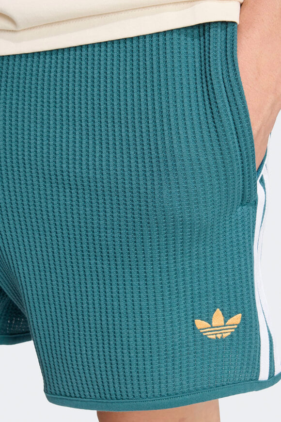Pantaloncini in tessuto goffrato - Tech Green