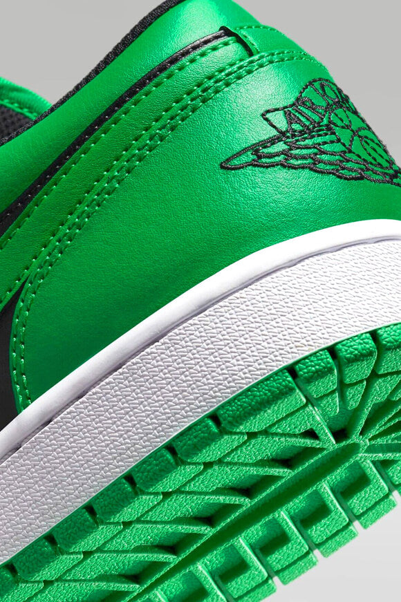 Air Jordan 1 Sneaker - Black + Lucky Green + White