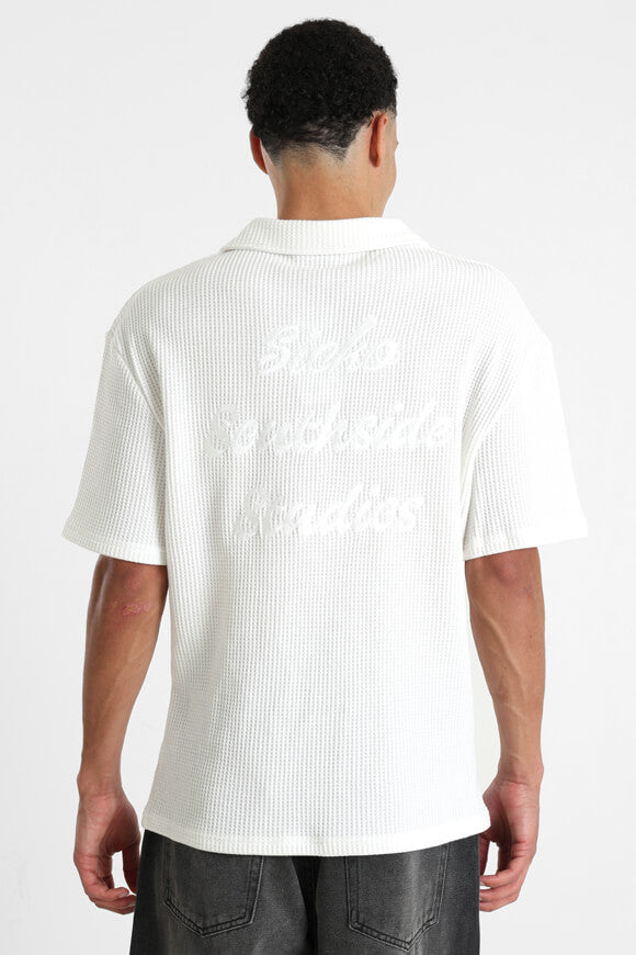 Polo con struttura waffle - bianco