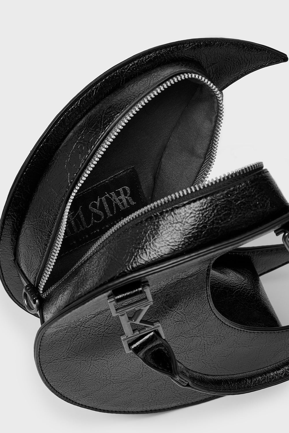 Waning Halo Hand- / Umhängetasche - Black