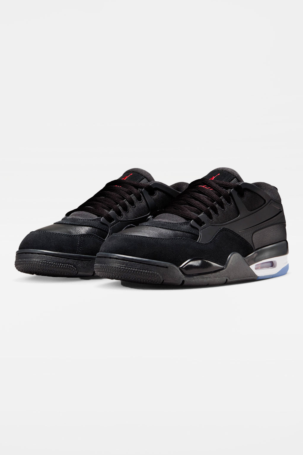 Air Jordan 4 RM Sneaker - Black + White + Varsity Red