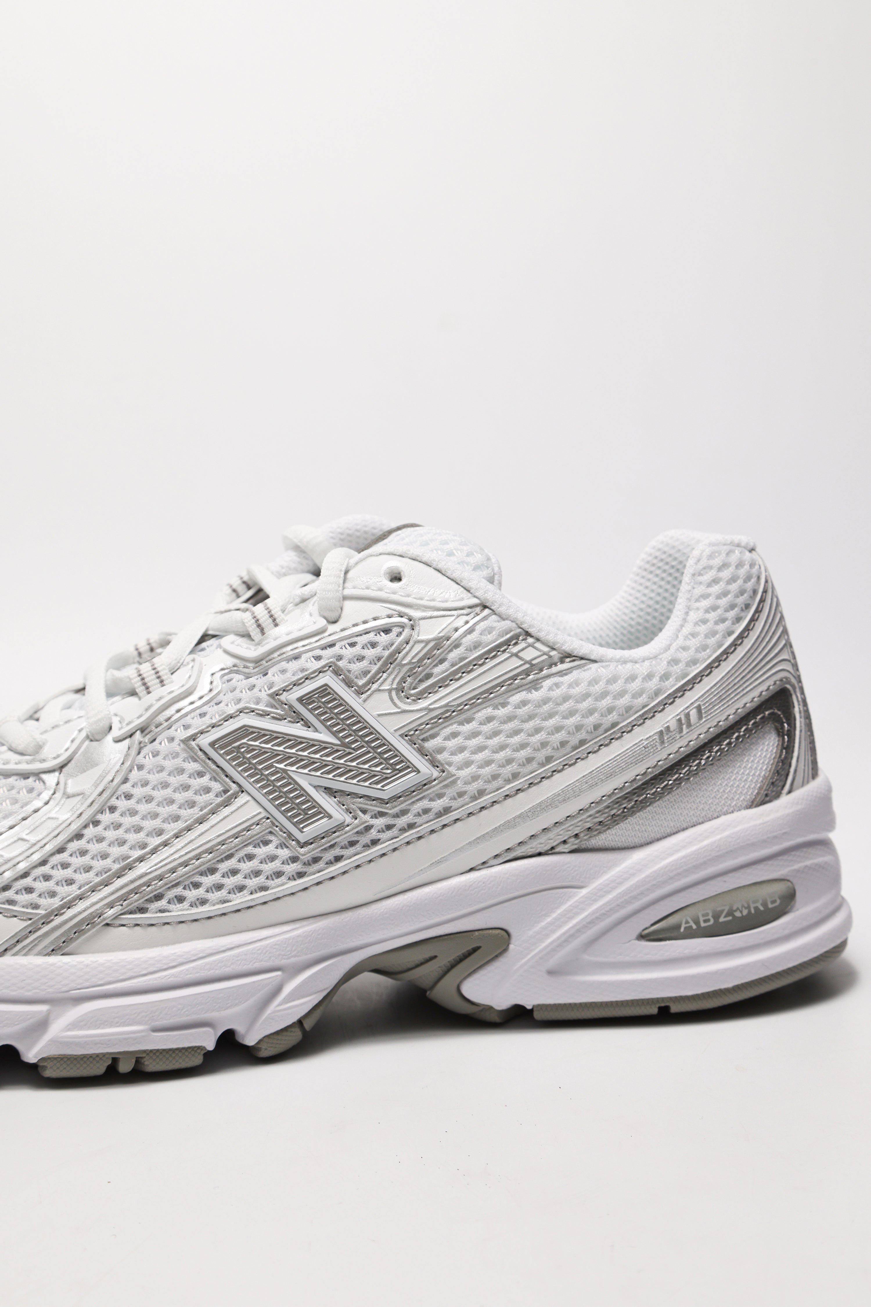 U 740 Core Sneaker - White + Metallic Silver