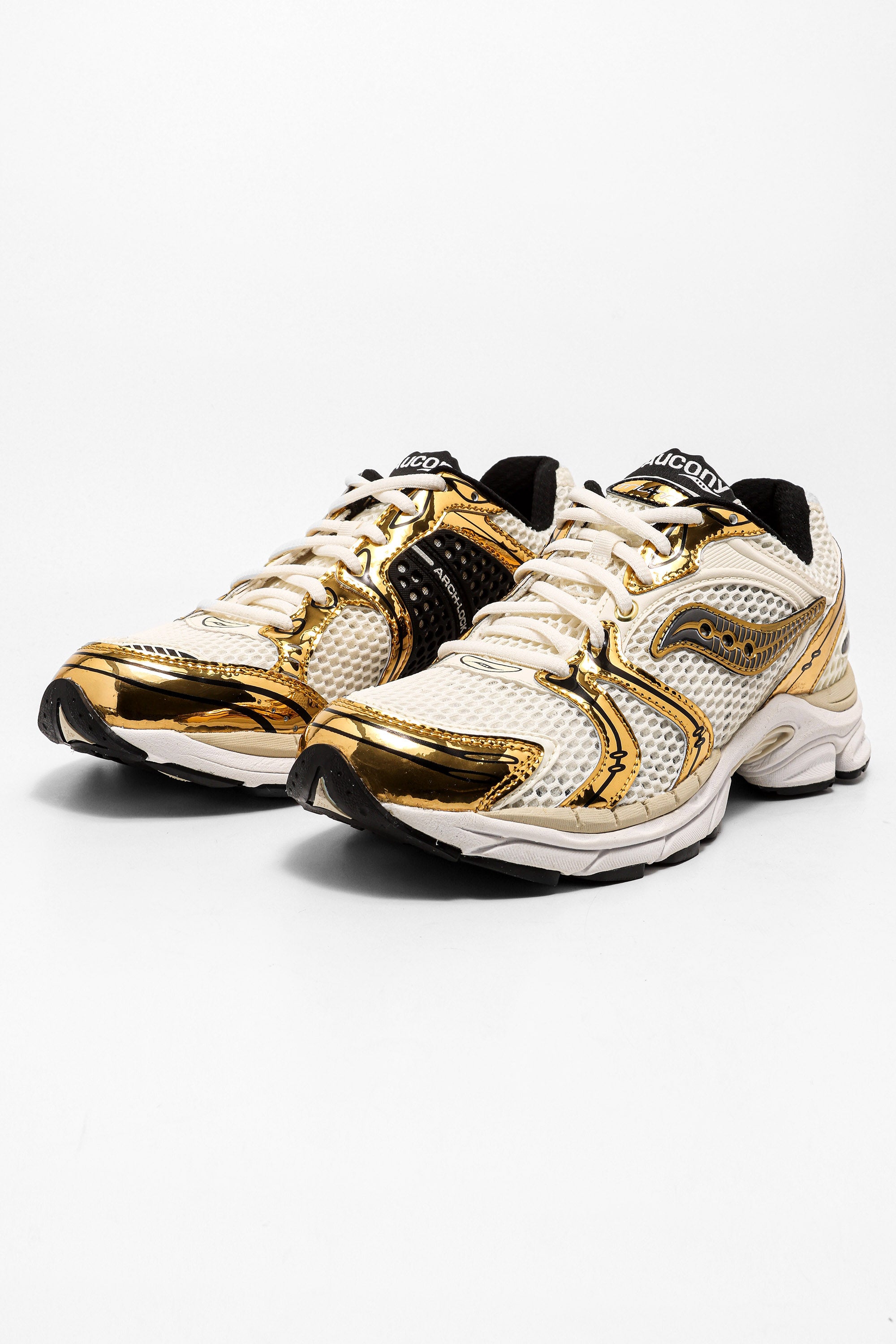 Progrid Triumph 4 sneakers - Egret + Black