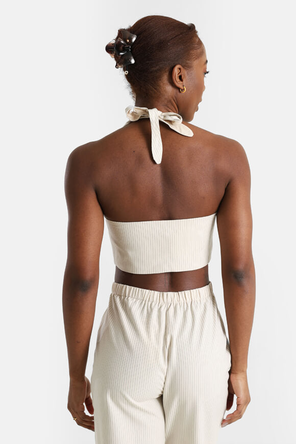 Crop top con scollo a farfalla - beige chiaro