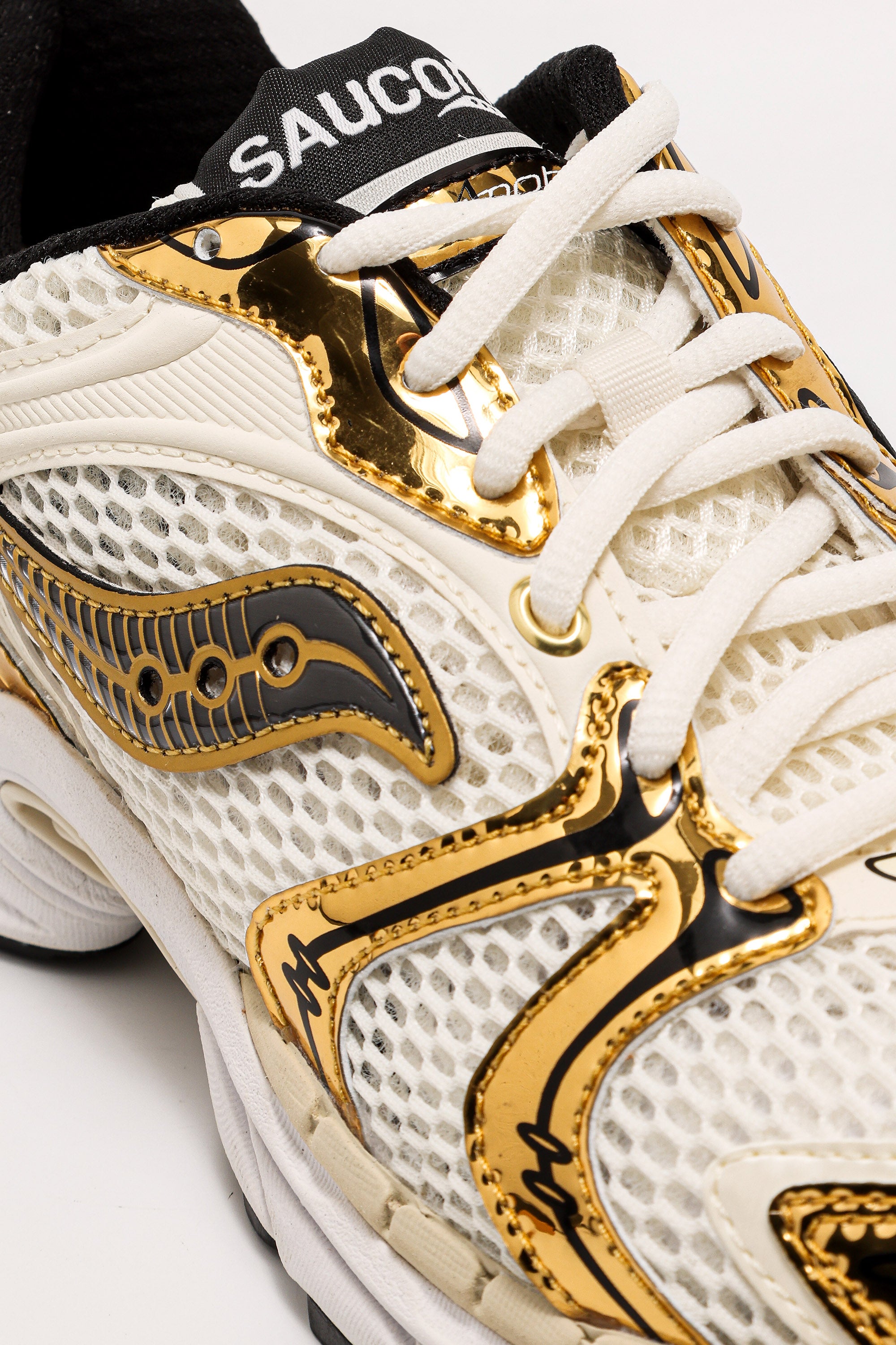 Progrid Triumph 4 sneakers - Egret + Black