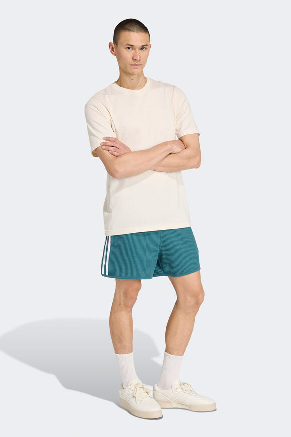 Pantaloncini in tessuto goffrato - Tech Green