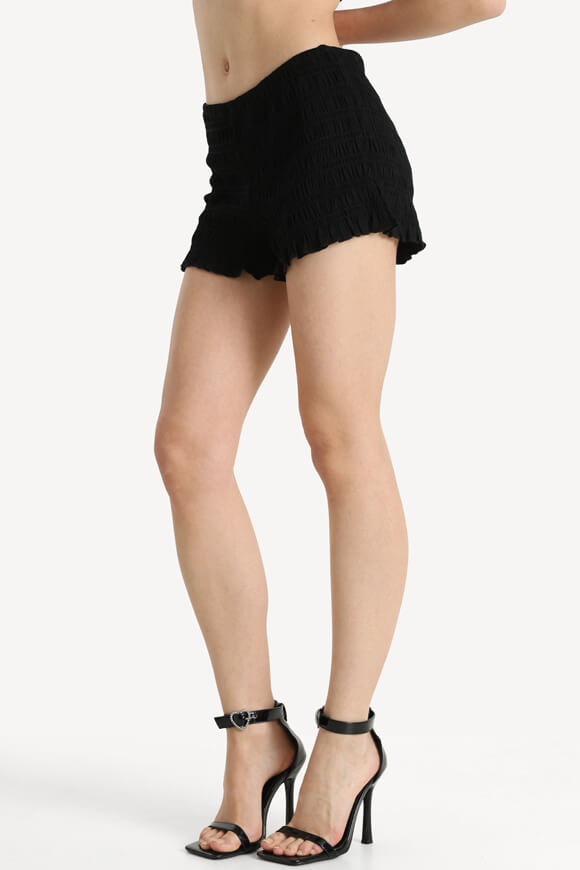 Pantaloncini in tessuto smocked - Nero