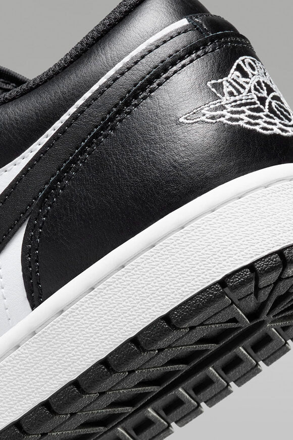 Air Jordan 1 Sneaker - White + Black