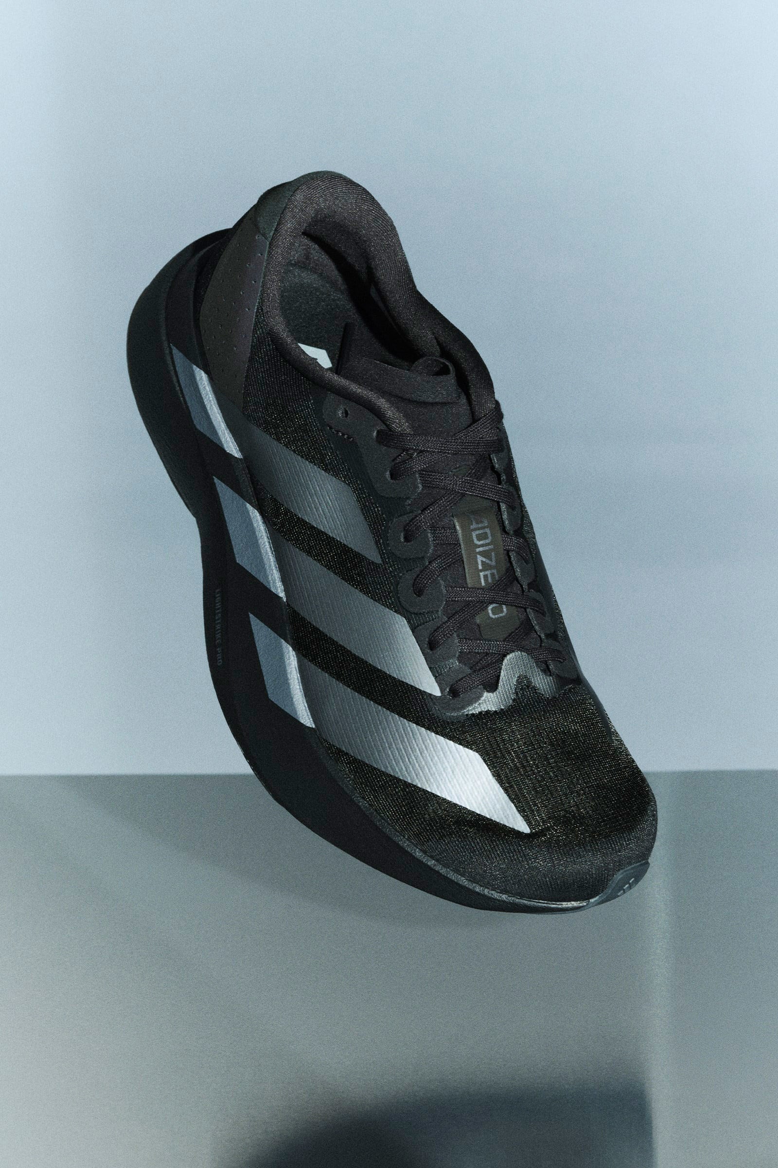 Adizero Evo SL chaussures de course - Core Black + Iron Metallic