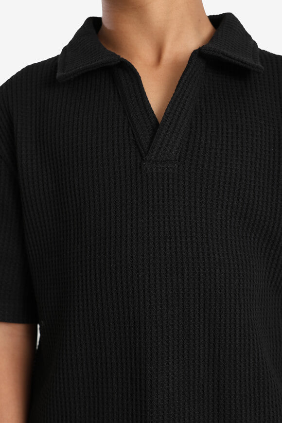 Poloshirt mit Waffelstruktur - Schwarz