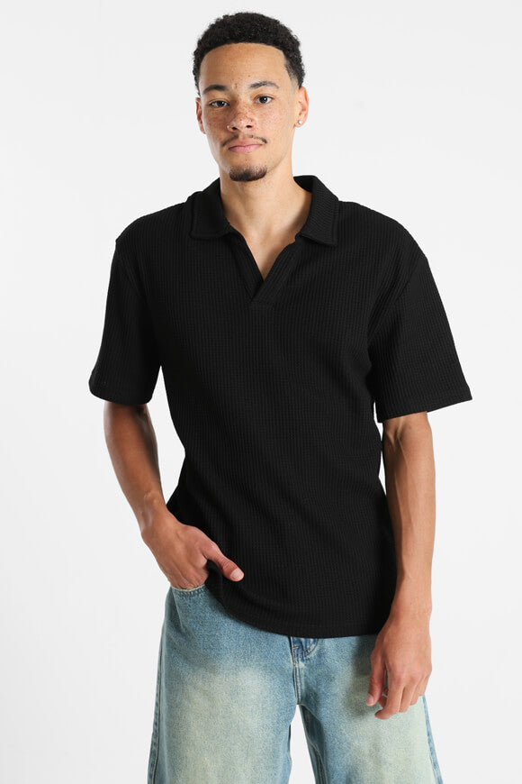 Polo con struttura waffle - nero