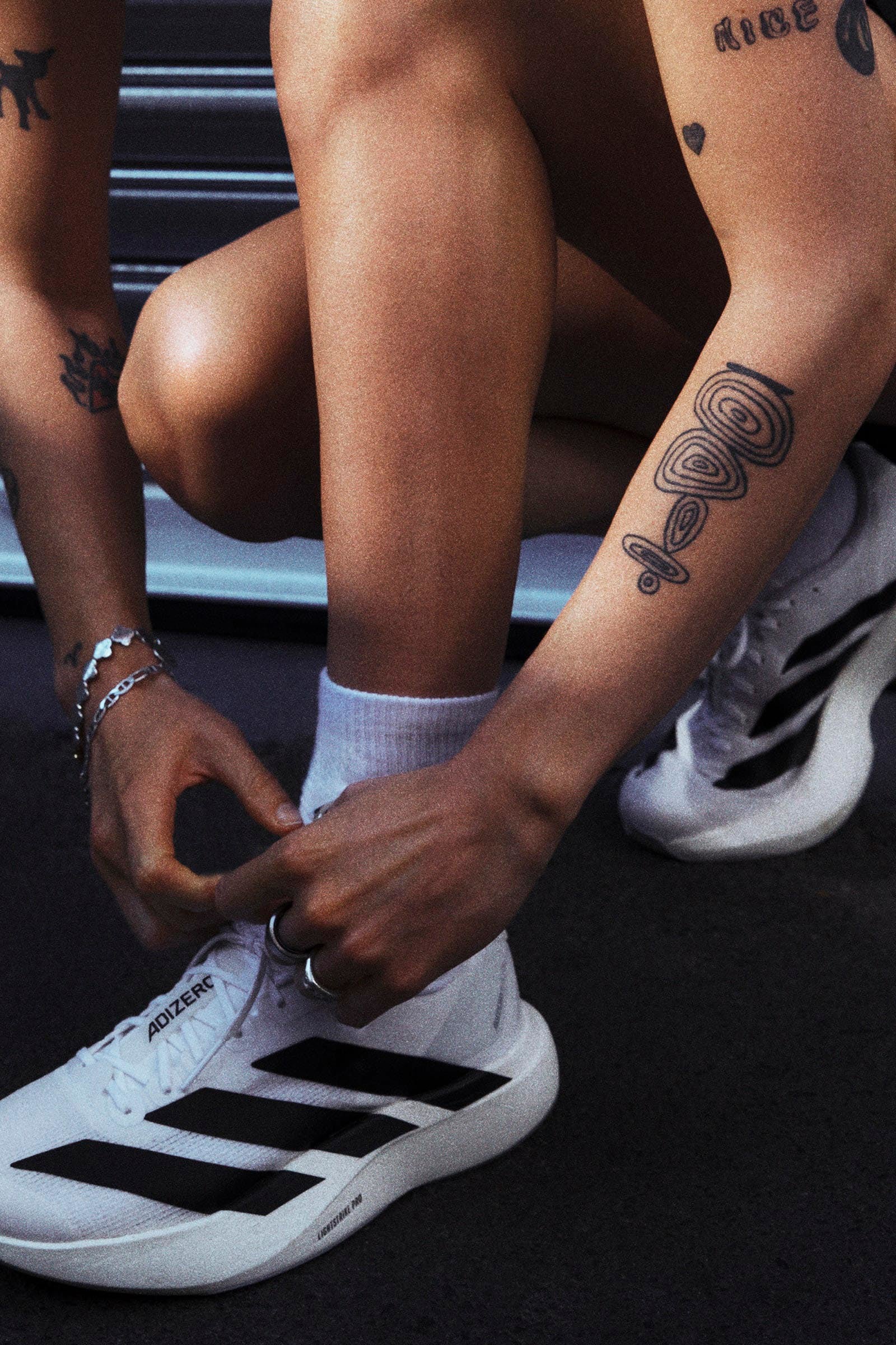 Adizero Evo SL Laufschuhe - Footwear White + Core Black