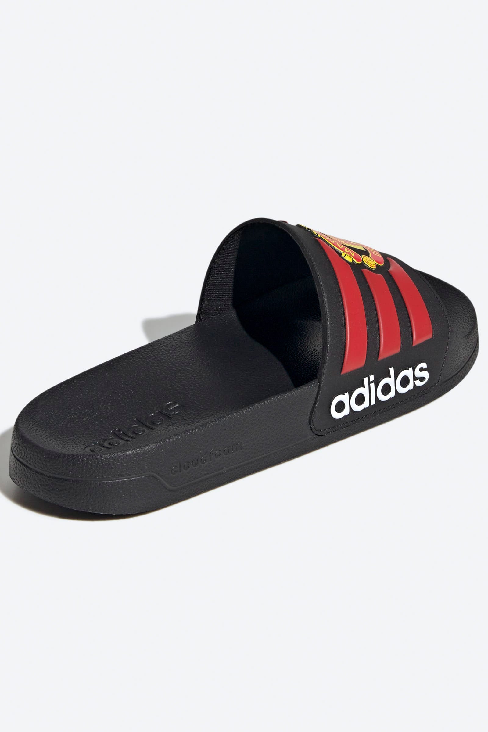 Adilette Manchester United Pantoletten - Core Black + Red + Cloud White